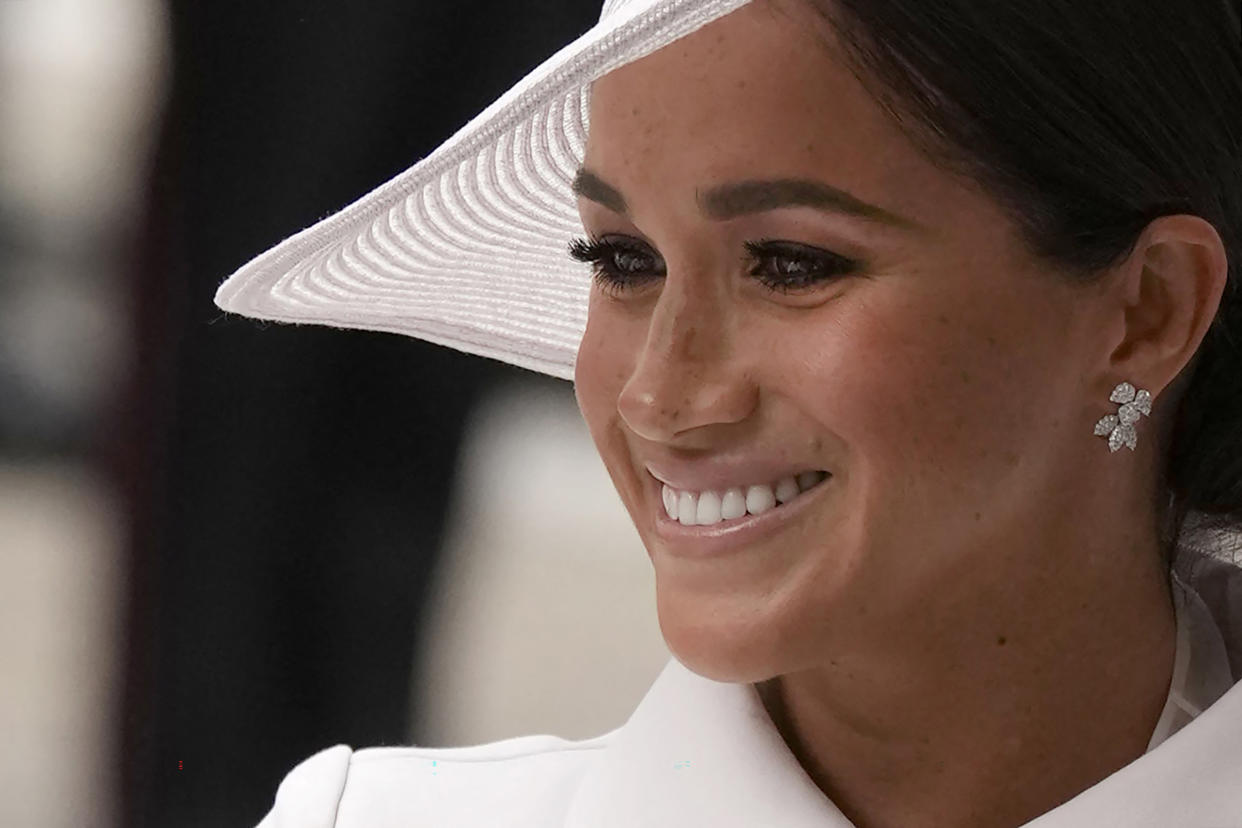 Britain's Meghan, Duchess of Sussex arrives to attend the National Service of Thanksgiving for The Queen's reign at Saint Paul's Cathedral in London on June 3, 2022 as part of Queen Elizabeth II's platinum jubilee celebrations. - Queen Elizabeth II kicked off the first of four days of celebrations marking her record-breaking 70 years on the throne, to cheering crowds of tens of thousands of people. But the 96-year-old sovereign's appearance at the Platinum Jubilee -- a milestone never previously reached by a British monarch -- took its toll, forcing her to pull out of a planned church service. (Photo by Matt Dunham / POOL / AFP) (Photo by MATT DUNHAM/POOL/AFP via Getty Images)