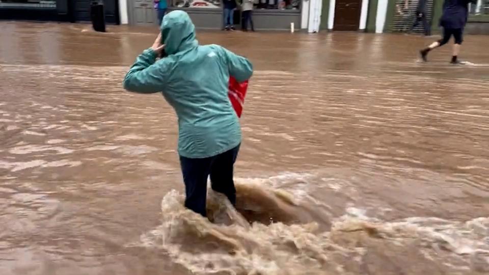 Flooded street in Midleton, Co Cork (PA)