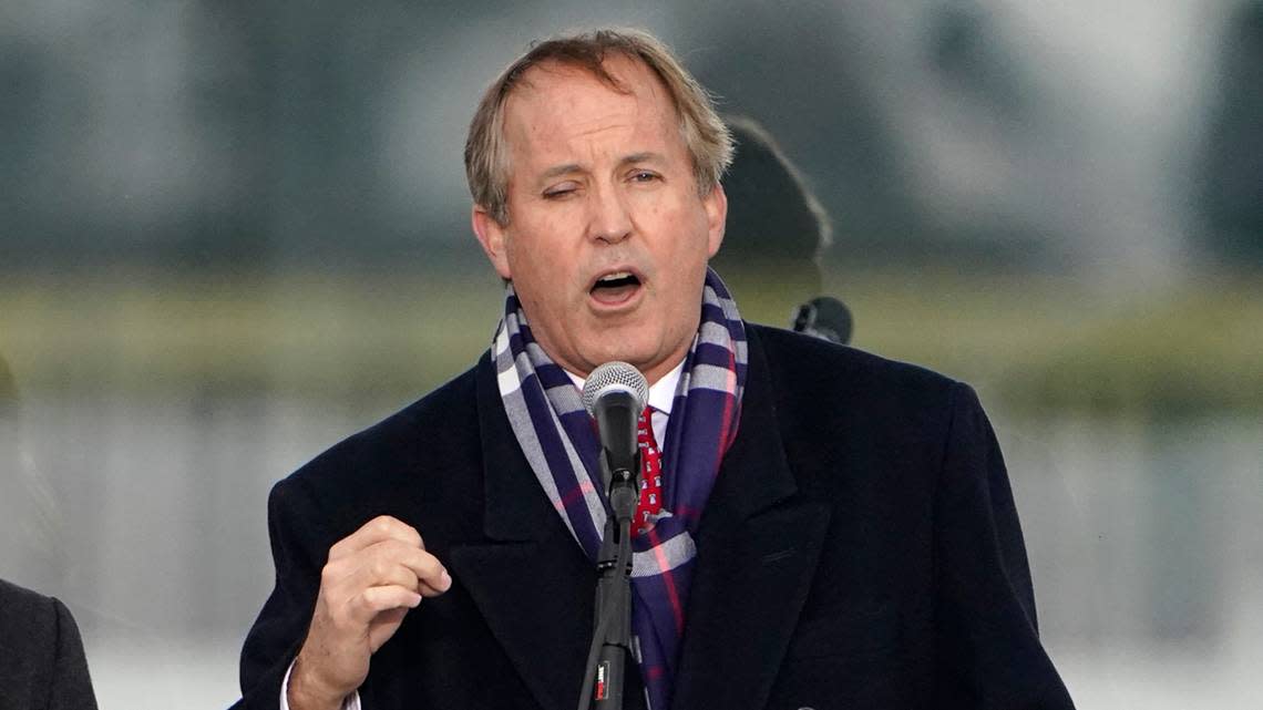 In this Jan. 6, 2021, file photo, Texas Attorney General Ken Paxton speaks in Washington, at a rally in support of President Donald Trump.