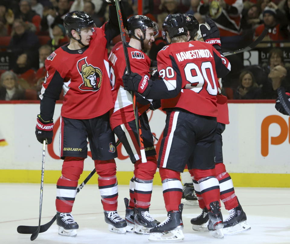 Ottawa Senators right wing Connor Brown (28) celebrates his goal with teammates during second-period NHL hockey game action against the Calgary Flames in Ottawa, Ontario, Saturday, Jan. 18, 2020. (Fred Chartrand/The Canadian Press via AP)
