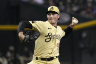 Arizona Diamondbacks pitcher Tommy Henry throws to a San Francisco Giants batter during the first inning during a baseball game Friday, Sept. 23, 2022, in Phoenix. (AP Photo/Rick Scuteri)