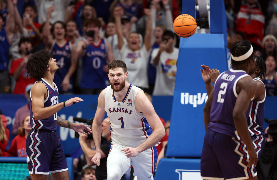 LAWRENCE, KANSAS - JANUARY 06:  Hunter Dickinson #1 of the Kansas Jayhawks reacts after scoring the final basket during the 2nd half against the TCU Horned Frogs as the Jayhawks defeat the Horned Frogs 83-81 to win the game at Allen Fieldhouse on January 06, 2024 in Lawrence, Kansas. (Photo by Jamie Squire/Getty Images)