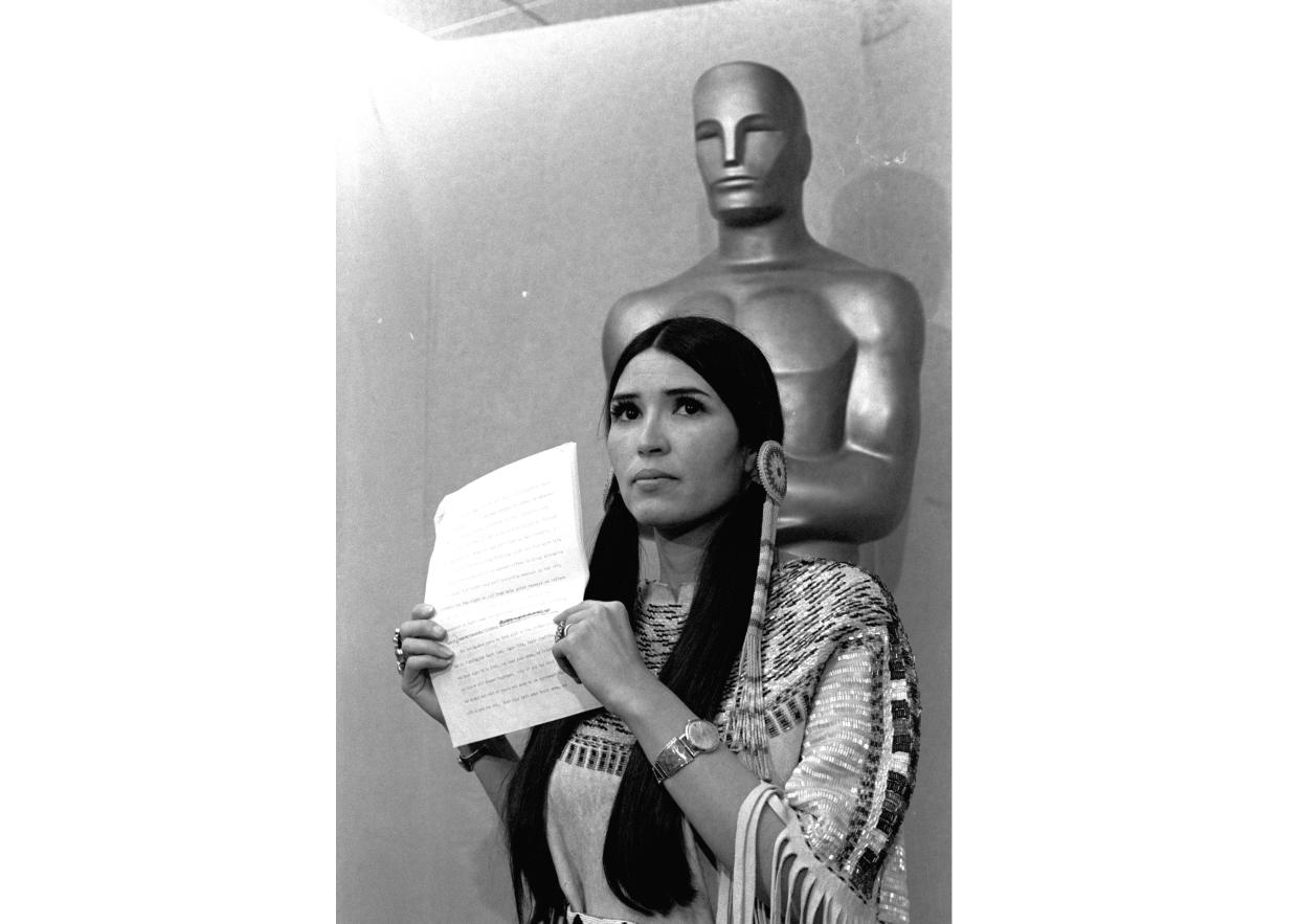 Sacheen Littlefeather appears at the Academy Awards ceremony to announce that Marlon Brando was declining his Oscar as best actor for his role in "The Godfather," on March 27, 1973.