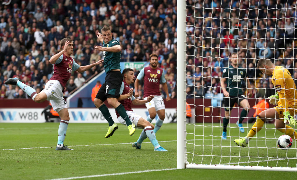 BIRMINGHAM, ENGLAND - SEPTEMBER 28 : Chris Wood of Burnley scores his team's second goal during the Premier League match between Aston Villa and Burnley FC at Villa Park on September 28, 2019 in Birmingham, United Kingdom. (Photo by Ian MacNicol/Getty Images)