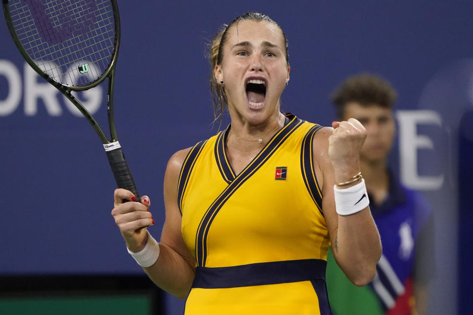 Aryna Sabalenka, of Belarus, reacts after defeating Elise Mertens, of Belgium, during the fourth round of the US Open tennis championships, Sunday, Sept. 5, 2021, in New York. (AP Photo/John Minchillo)