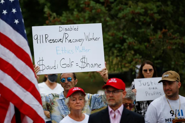 Family members and survivors from the organization 9/11 Justice protest against the Saudi Arabian-funded golf series and its tournament being held at the Trump National Golf Club in Bedminster, New Jersey, U.S., July 29, 2022.