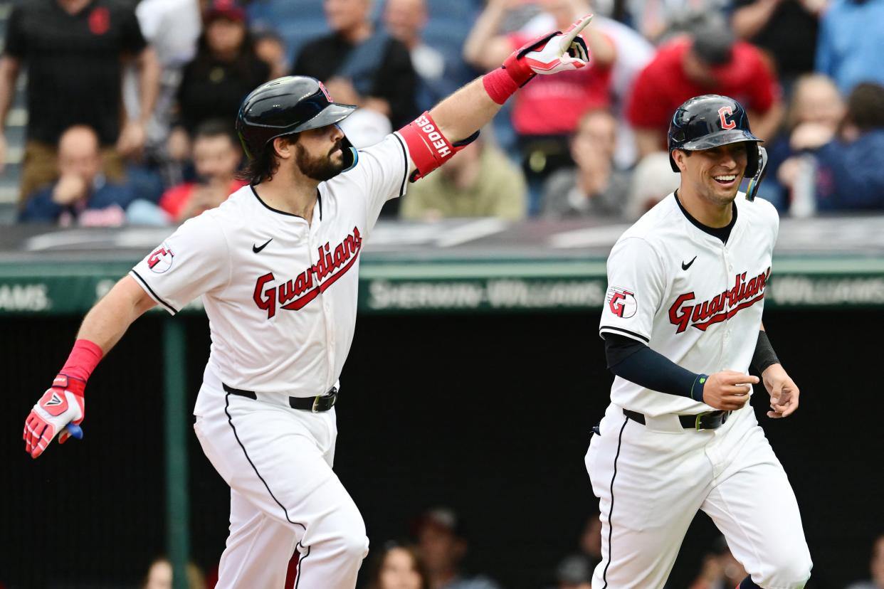 Guardians catcher Austin Hedges, left, and center fielder Tyler Freeman celebrate after Hedges hit a home run during the second inning against the Angels, May 4, 2024, in Cleveland.