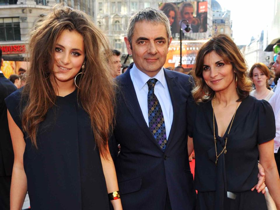 <p>Jon Furniss/WireImage</p> Lily Atkinson, actor Rowan Atkinson and Sunetra Sastry attend the 