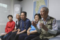 Chung Su-jin, right, speaks during an interview at a house of Shin Yun-sun, second from right, in Seoul, South Korea, Wednesday, July 29, 2020. The thousands of husbands and fathers who never returned from Sakhalin after eight decades is a largely forgotten legacy of Japan’s brutal rule of the Korean Peninsula before the end of World War II. Chung, 83, and Shin, 75, are among about 400 aging relatives who hope to bring back the remains of the missing workers, seeking closure after years of emotional distress and economic hardship that affected many of the broken families( (AP Photo/Ahn Young-joon)