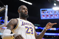 Los Angeles Lakers forward LeBron James gestures after scoring during the first half of an NBA basketball game against the Portland Trail Blazers Sunday, Jan. 21, 2024, in Los Angeles. (AP Photo/Mark J. Terrill)