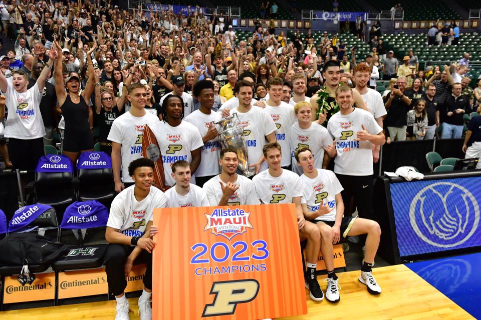 Purdue players gather together after their defeat of Marquette in the Maui Invitational championship game at SimpliFi Arena at Stan Sheriff Center.