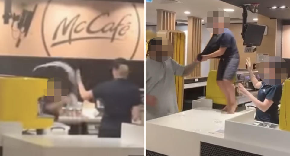 A boy throws his drink at a McCafe employee. A man grabs his t-shirt as he stands on the counter.