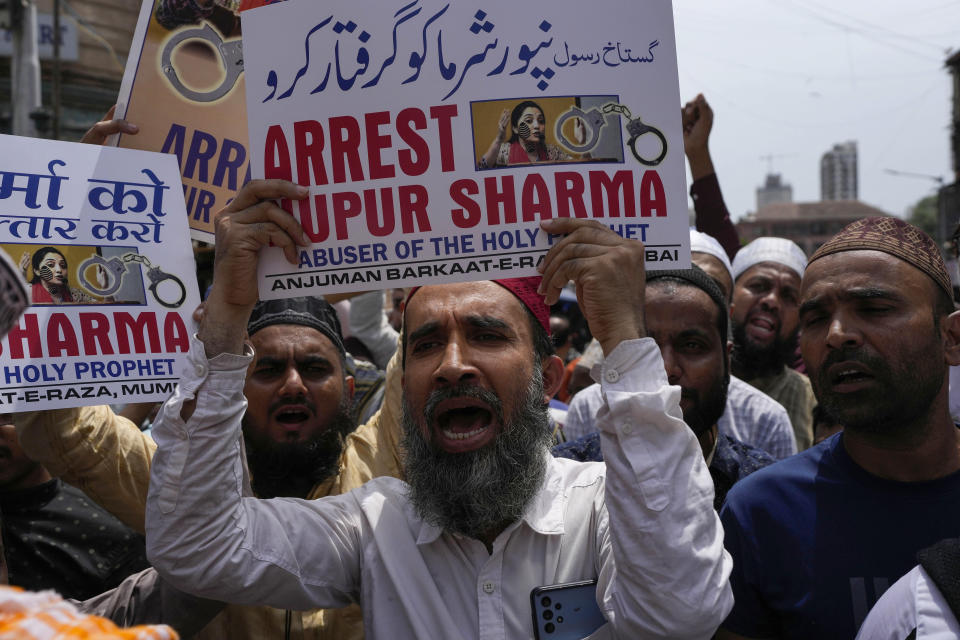 Indian Muslims shout slogans as they react to the derogatory references to Islam and the Prophet Muhammad made by top officials in the governing Hindu nationalist party during a protest in Mumbai, India, Monday, June 6, 2022. At least five Arab nations have lodged official protests against India, and Pakistan and Afghanistan also reacted strongly Monday to the comments made by two prominent spokespeople from Prime Minister Narendra Modi's Bharatiya Janata Party. (AP Photo/Rafiq Maqbool)