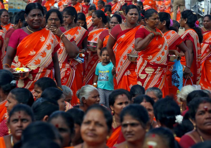 FILE PHOTO: Women gather during a prayer ceremony for the victims of the 2004 tsunami on the 15th anniversary of the disaster, in Chennai