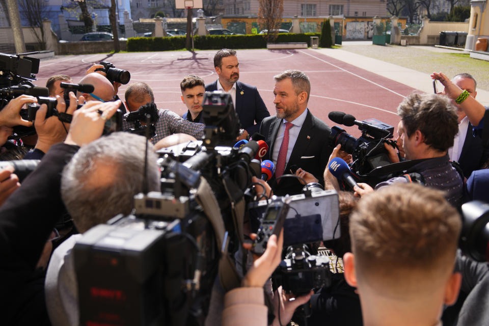 FILE - Presidential candidate Peter Pellegrini, who currently serves as Parliament's speaker, answers questions to the media after casting his vote during the first round of the presidential election in Bratislava, Slovakia, Saturday, March 23, 2024. Ivan Korcok, a pro-western career diplomat and Peter Pellegrini, a close ally of Slovakia's populist Prime Minister Robert Fico, are facing each other in a presidential runoff on Saturday, April 6, 2024, to determine who succeeds Zuzana Caputova, the country's first female head of state. (AP Photo/Petr David Josek, File)