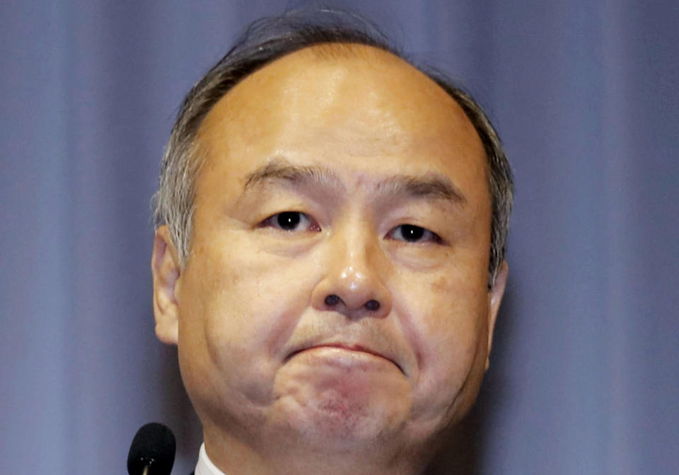 FILE - In this Nov. 5, 2018, file photo, SoftBank Group Corp. Chief Executive Masayoshi Son speaks during a press conference in Tokyo. Son, the chief executive of Japanese technology company SoftBank Group Corp. said Thursday, June 25, 2020, that he is stepping down from the board of Chinese e-commerce giant Alibaba.(Daiki Katagiri/Kyodo News via AP, File)