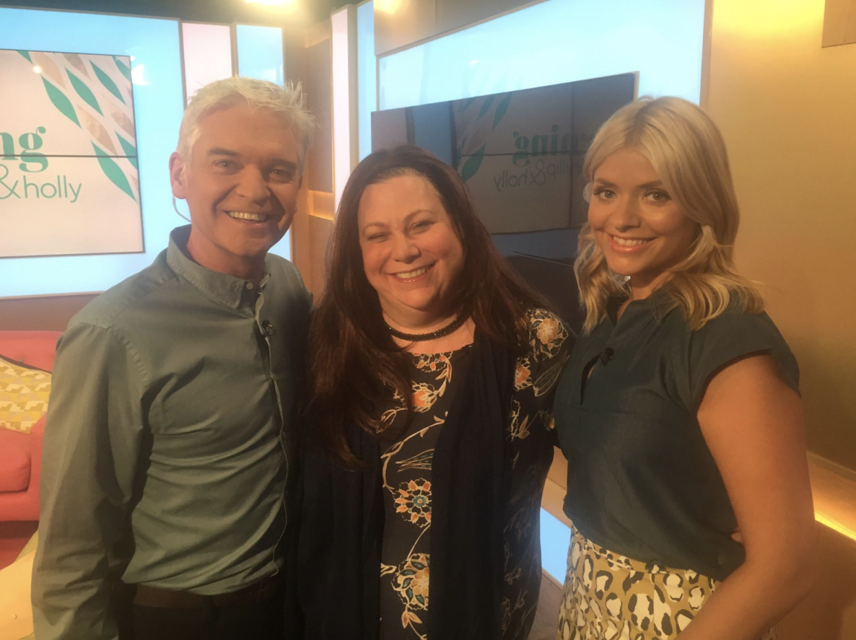 Sarah Bowles (centre) pictured with 'This Morning' presenters Phillip Schofield and Holly Willoughby in 2016. (Supplied)