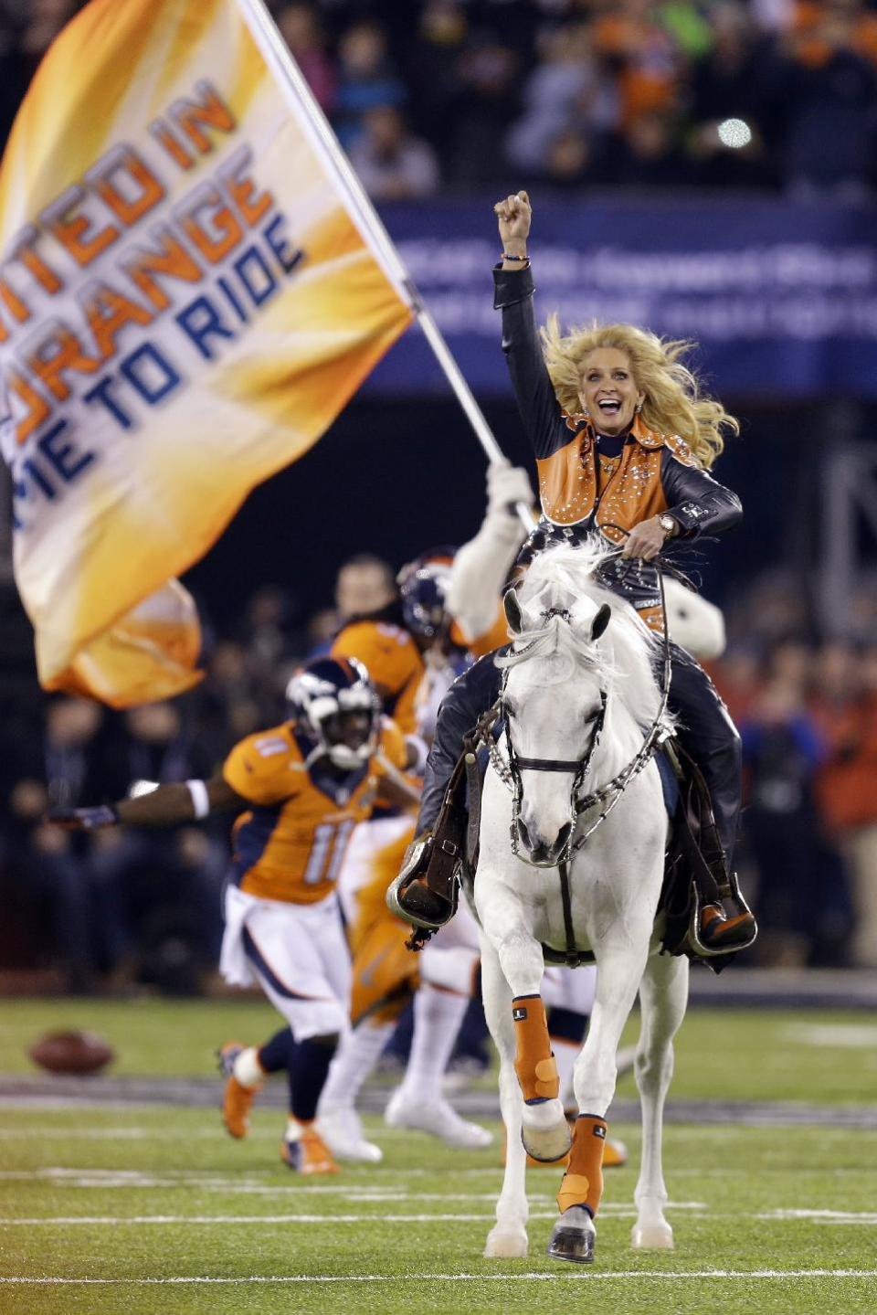 Thunder leads the Denver Broncos players onto the field before the NFL Super Bowl XLVIII football game against the Seattle Seahawks Sunday, Feb. 2, 2014, in East Rutherford, N.J. (AP Photo/Ben Margot)