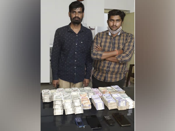 The two accused, identified as Manish Toshniwal and Vishnu Biradar, were found in possession of unaccounted cash and one Honda Activa in Hyderabad on Friday. (Photo/ANI)