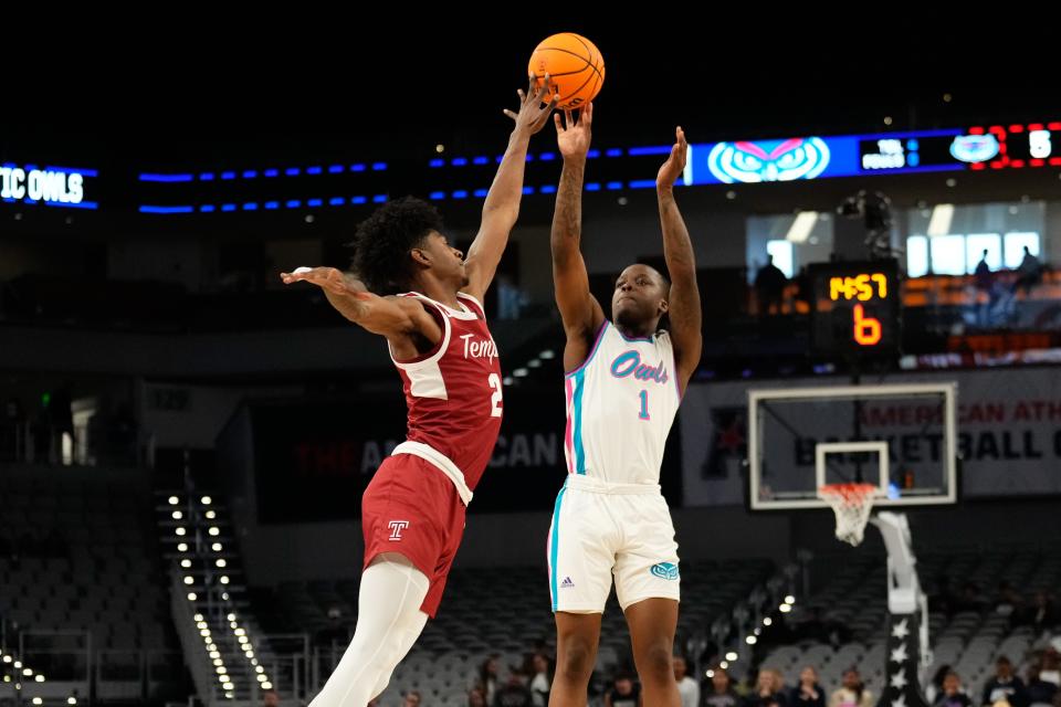 Mar 16, 2024; Fort Worth, TX, USA; Florida Atlantic Owls guard Johnell Davis (1) has his shot blocked by Temple Owls guard Jahlil White (2) during the first half at Dickies Arena. Mandatory Credit: Chris Jones-USA TODAY Sports