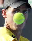 Vasek Pospisil of Canada watches the ball during his men's singles match against Samuel Groth of Australia at the Australian Open 2014 tennis tournament in Melbourne January 13, 2014. REUTERS/Bobby Yip (AUSTRALIA - Tags: SPORT TENNIS)