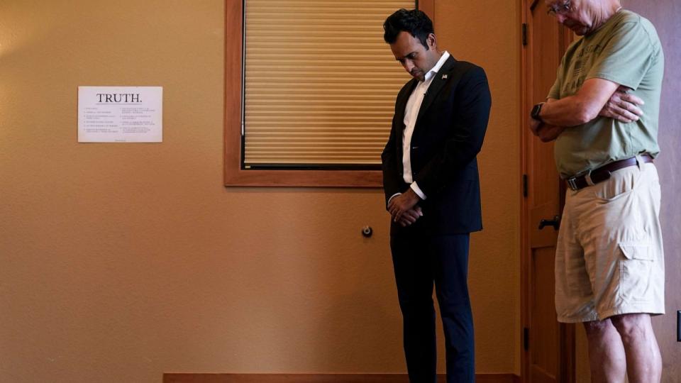 PHOTO: Republican presidential candidate Vivek Ramaswamy waits to speak at a town hall meeting, Sept. 8, 2023, in Carroll, Iowa. (Charlie Neibergall/AP)