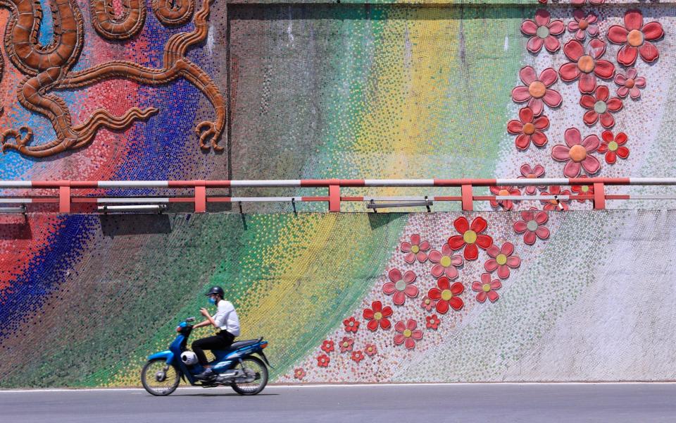 Normally bustling city streets have emptied out - Hau Dinh/AP