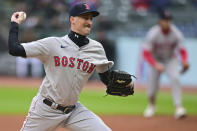 Boston Red Sox starting pitcher Cooper Criswell delivers during the first inning of the team's baseball game against the Cleveland Guardians, Wednesday, April 24, 2024, in Cleveland. (AP Photo/David Dermer)