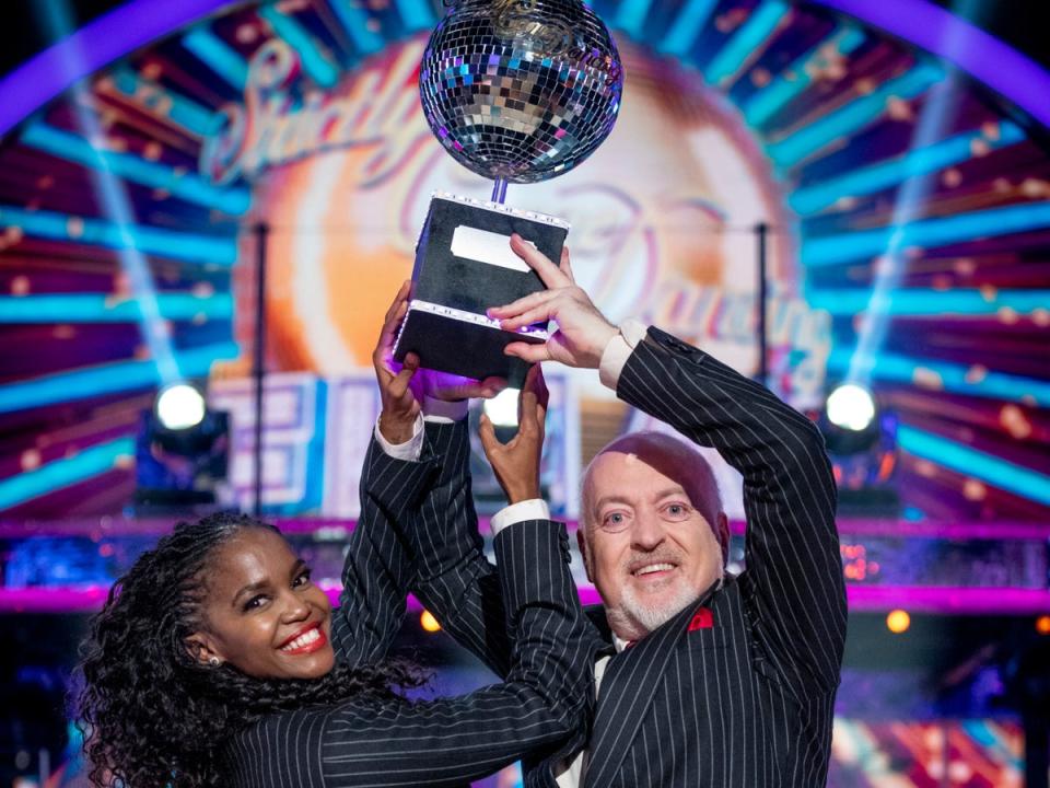 Mabuse and Bailey with the glitterball trophy (BBC/Guy Levy)