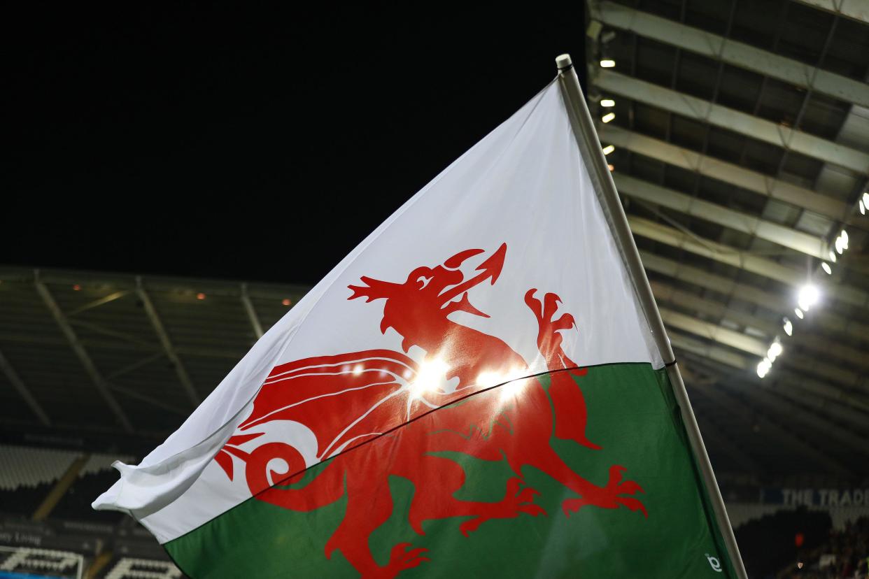Swansea, UK. 05th Dec, 2023. A Welsh flag ahead of the game. Wales women v Germany women, UEFA Women's Nations league, group C match at the Swansea.com Stadium, South Wales on Tuesday 5th December 2023. Editorial use only, pic by Andrew Orchard/Andrew Orchard sports photography/Alamy Live news Credit: Andrew Orchard sports photography/Alamy Live News