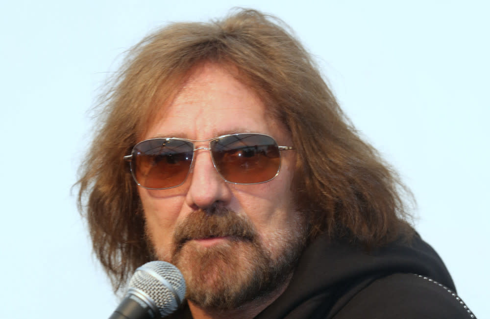 Geezer Butler has had COVID-19 and injured his ribs, according to bandmate Tony Iommi credit:Bang Showbiz