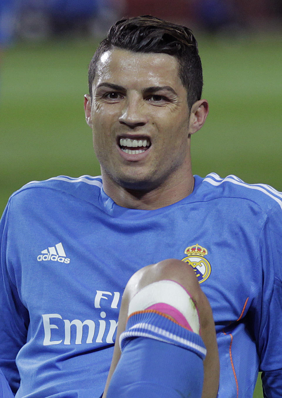 Real Madrid's Cristiano Ronaldo from Portugal reacts during a La Liga soccer match against Sevilla at the Ramon Sanchez Pizjuan stadium, in Seville, Spain on Wednesday, March 26, 2014. (AP Photo/Angel Fernandez)