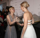 <p>The two greet each other on the red carpet. (Photo: Getty Images) </p>