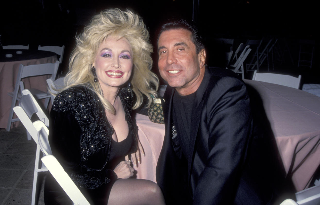 Dolly Parton with Sandy Gallin in 1992. (Photo: Ron Galella, Ltd. via Getty Images)