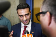 Republican Abraham Hamadeh, candidate Arizona Attorney General, speaks with the media after a televised debate against Democrat Kris Mayes, Wednesday, Sept. 28, 2022. (AP Photo/Ross D. Franklin)