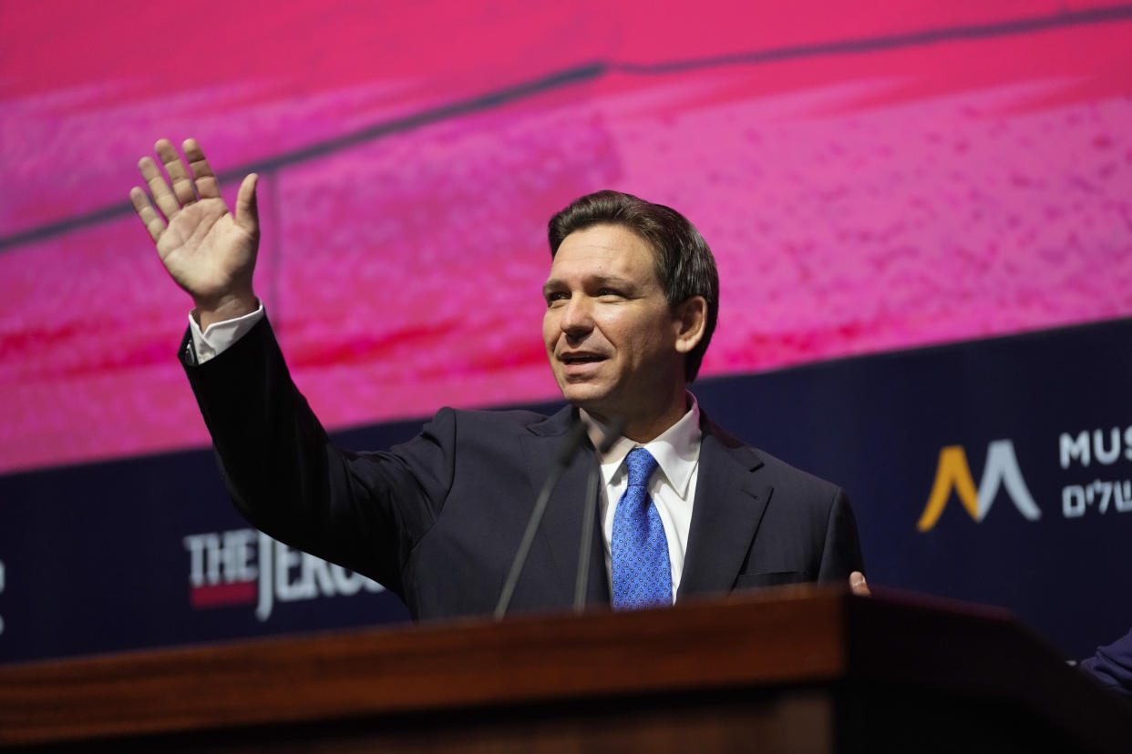 Florida Gov. Ron DeSantis waves as he arrives to a conference titled "Celebrate the Faces of Israel" at Jerusalem's Museum of Tolerance, Thursday, April 27, 2023. (AP Photo/Maya Alleruzzo, Pool)