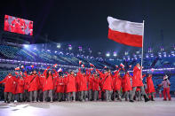 <p>Flag bearer Zbigniew Brodka of Poland and teammates arrive during the Opening Ceremony of the PyeongChang 2018 Winter Olympic Games at PyeongChang Olympic Stadium on February 9, 2018 in Pyeongchang-gun, South Korea. (Photo by Matthias Hangst/Getty Images) </p>