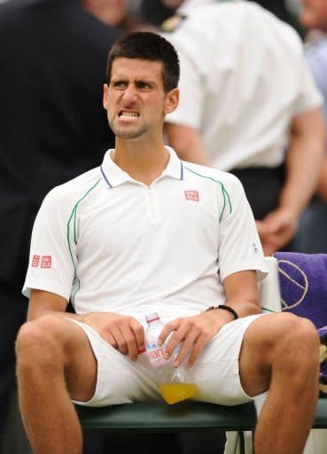 Serbia's Novak Djokovic ponders after losing the first set of his third round men's singles match against Czech Republic's Radek Stepanek. He came back to win 4-6, 6-2, 6-2, 6-2