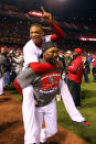 ST LOUIS, MO - OCTOBER 28: Adron Chambers #56 and Arthur Rhodes #53 of the St. Louis Cardinals celebrate after defeating the Texas Rangers 6-2 to win Game Seven of the MLB World Series at Busch Stadium on October 28, 2011 in St Louis, Missouri. (Photo by Dilip Vishwanat/Getty Images)