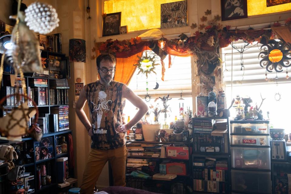 Carlos Brum inside his room at the Baltimore in Los Angeles.