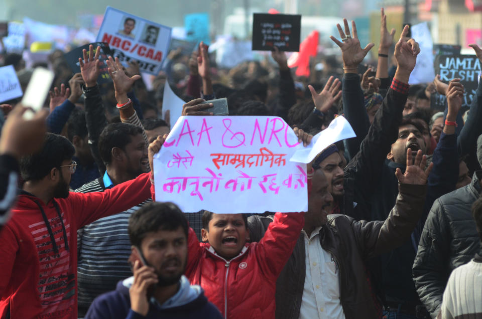 Protesters shout with placards during a demonstration against India's new citizenship law CAA ( Citizenship amandment Act ) in Allahabad on December 19,2019 . Indians defied bans nationwide as anger swells against a citizenship law seen as discriminatory against muslims, following days of protest, clashes, and riots that have left six dead .(Photo by Ritesh Shukla/NurPhoto via Getty Images)