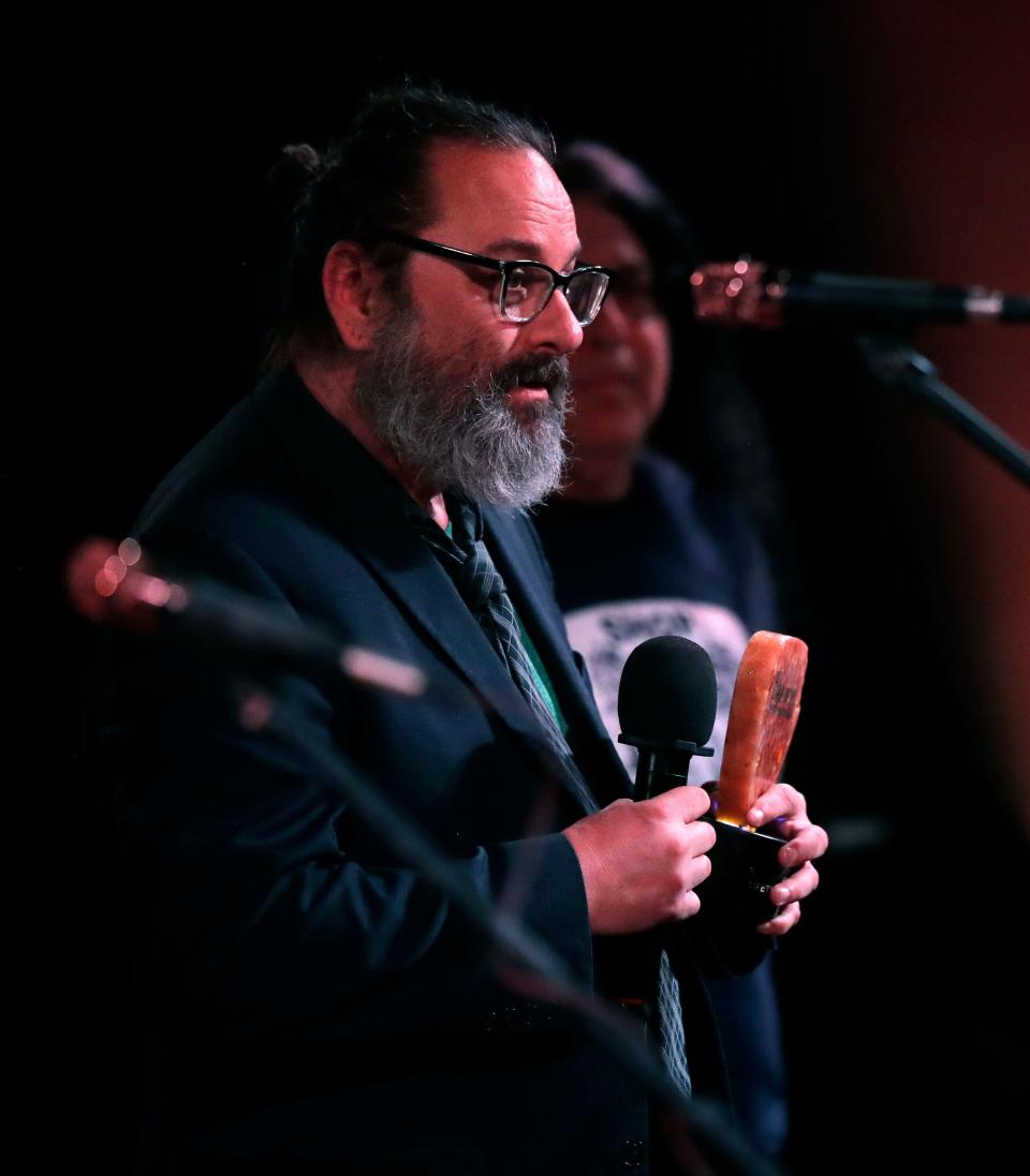 Jim Runge addresses the crowd after accepting the Lifetime Achievement Award at the Bay Area Music Awards in Green Bay on March 21.