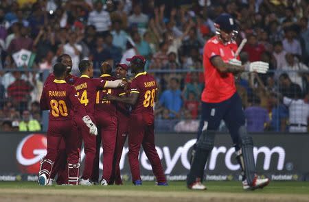 Cricket - England v West Indies - World Twenty20 cricket tournament final - Kolkata, India - 03/04/2016. West Indies players celebrate the dismissal of England's Alex Hales. REUTERS/Adnan Abidi