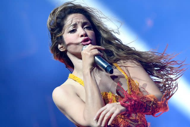 <p>VALERIE MACON/AFP via Getty</p> Shakira performing at Coachella in Indio in April 2024