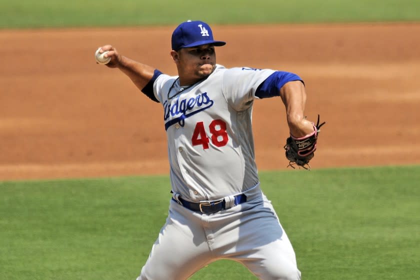 Los Angeles Dodgers starting pitcher Brusdar Graterol delivers a pitch against the San Diego Padres in the first inning of a baseball game Wednesday, Sept. 16, 2020, in San Diego. (AP Photo/Derrick Tuskan)