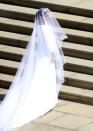 <p>Meghan Markle wore a Givenchy <a href="https://www.townandcountrymag.com/society/tradition/a13978425/meghan-markle-wedding-dress/" rel="nofollow noopener" target="_blank" data-ylk="slk:wedding dress;elm:context_link;itc:0;sec:content-canvas" class="link ">wedding dress</a> which was designed by the acclaimed British designer, Clare Waight Keller.</p>