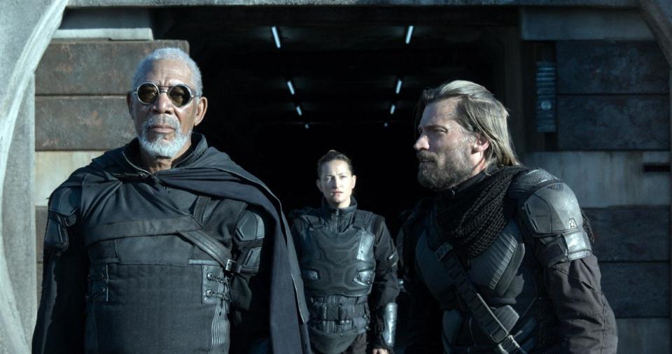 This film publicity image released by Universal Pictures shows Morgan Freeman, left, Andrea Riseborough and Nikolaj Coster-Waldau in a scene from "Oblivion." (AP Photo/Universal Pictures)