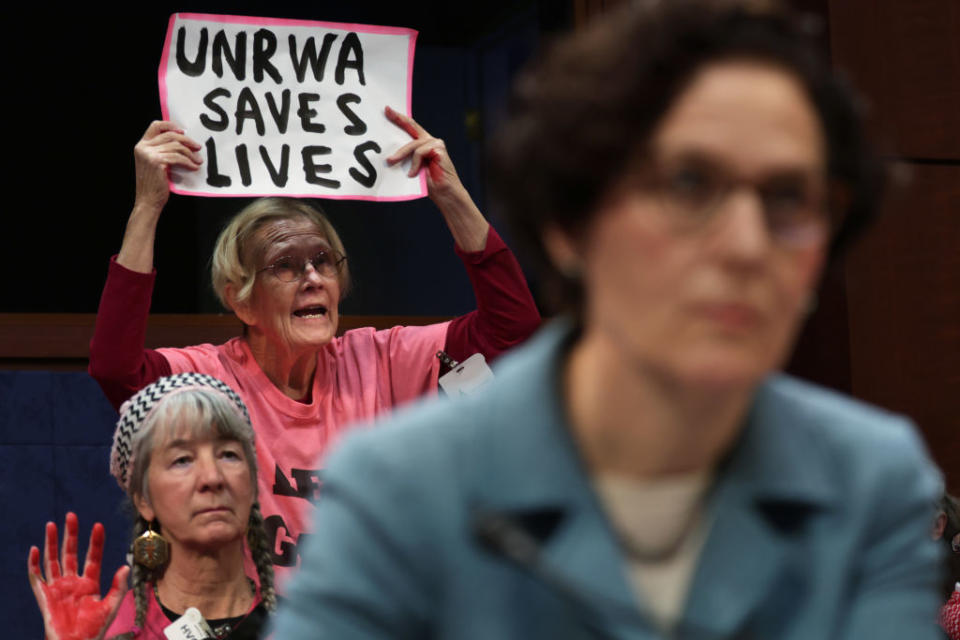 Demonstrators stage a protest during a hearing before the Subcommittee on Oversight and Accountability of House Foreign Affairs Committee on January 30, 2024 in Washington, DC. The subcommittee held a hearing titled “UNRWA Exposed: Examining the Agency’s Mission and Failures.” <span class="copyright">Alex Wong—Getty Images</span>