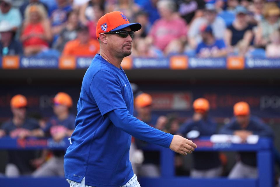 Mar 3, 2024; Port St. Lucie, Florida, USA; New York Mets manager Carlos Mendoza (28) walks back to the dugout after a pitching change in the second inning against the Houston Astros at Clover Park. Mandatory Credit: Jim Rassol-USA TODAY Sports