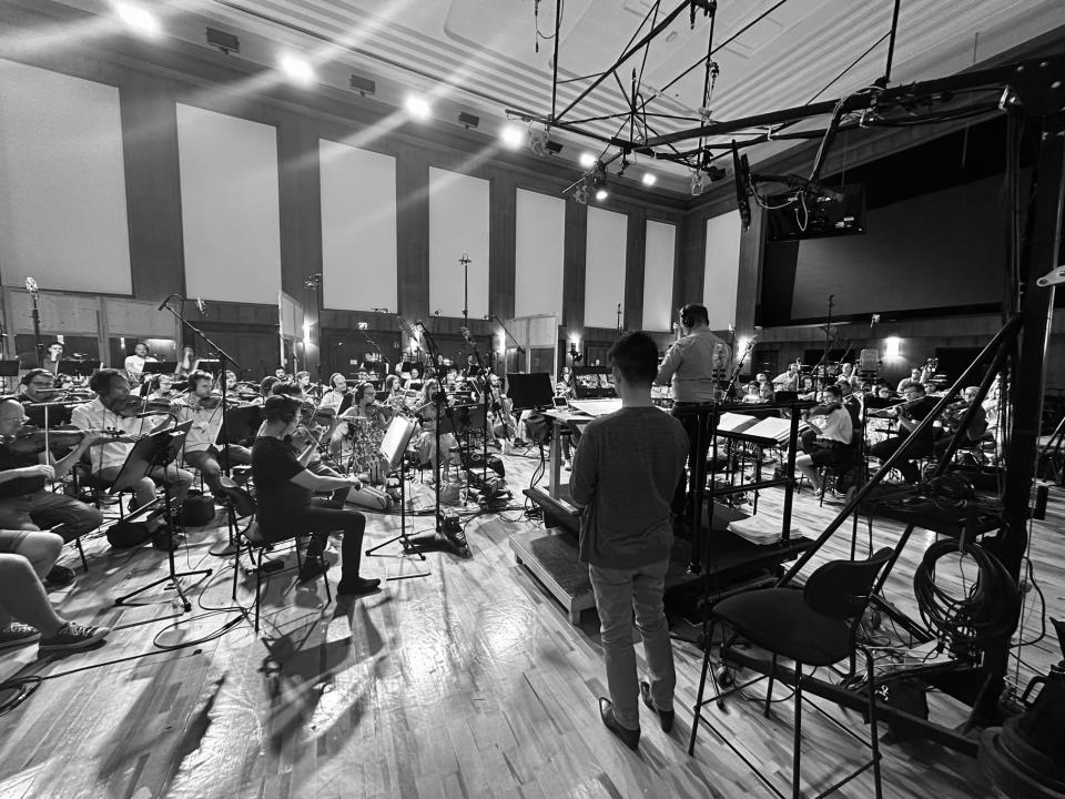 An orchestra performs music composed by Takeshi Furukawa for "Avatar: The Last Airbender." <span class="copyright">Takeshi Furukawa—Netflix</span>